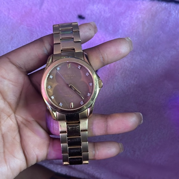 Gold stainless steel Armitron Watch